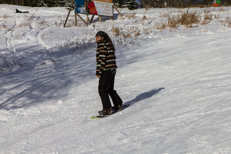 Snowboarder on a snowy slope in Winterberg